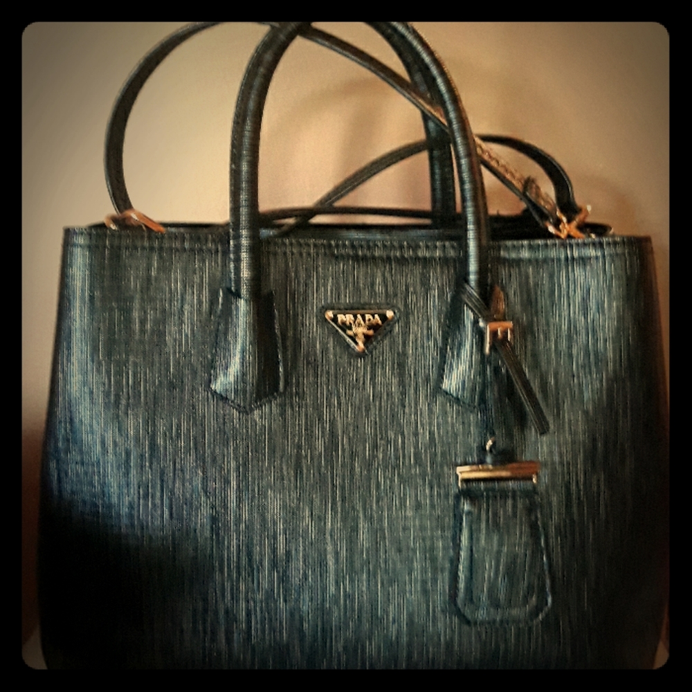 It's the original Prada Milano Dal 1913 Purse